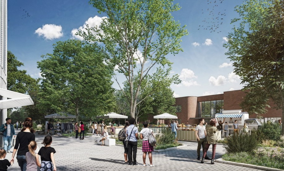 La place de la Bourgogne – côté marché (à gauche la halle de commerces et services et à droite la future crèche).